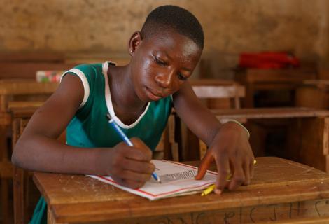 Ophelia 14 draws a building in her classroom.